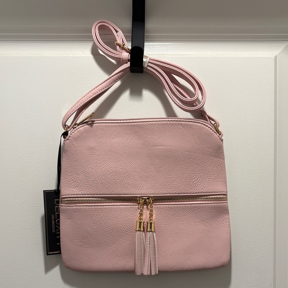 Elegant Pink Crossbody Bag with Tassels
